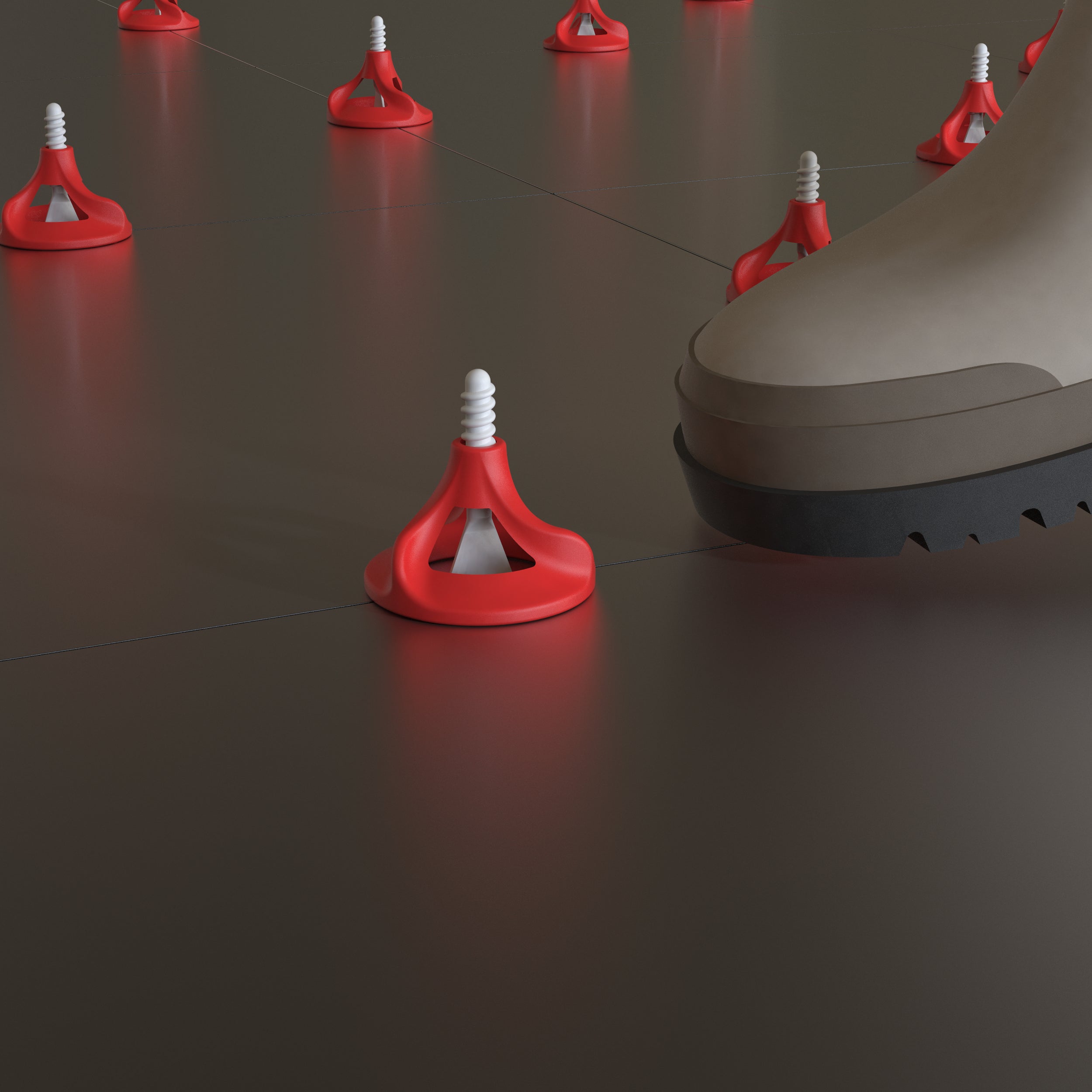 Twister PLUS tile levelling system in use on dark porcelain floor tiles - usage example