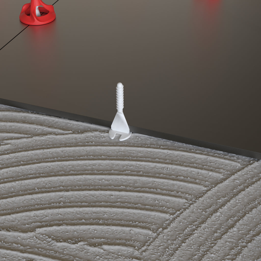 Twister PLUS tile levelling system in use on dark porcelain floor tiles - screw only